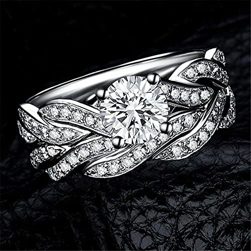 Casal toca o anel de casamento dela, os anéis correspondentes de ouro branco banhado AAA CZ Titanium mass